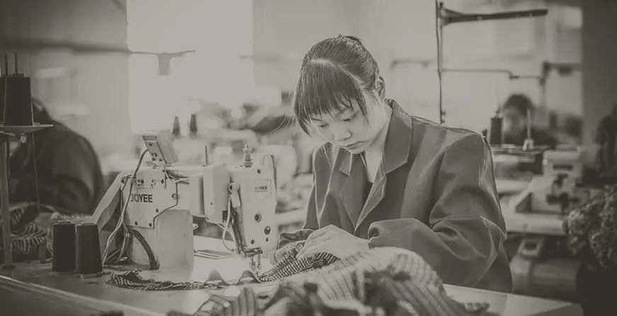 Seamstress in garment production